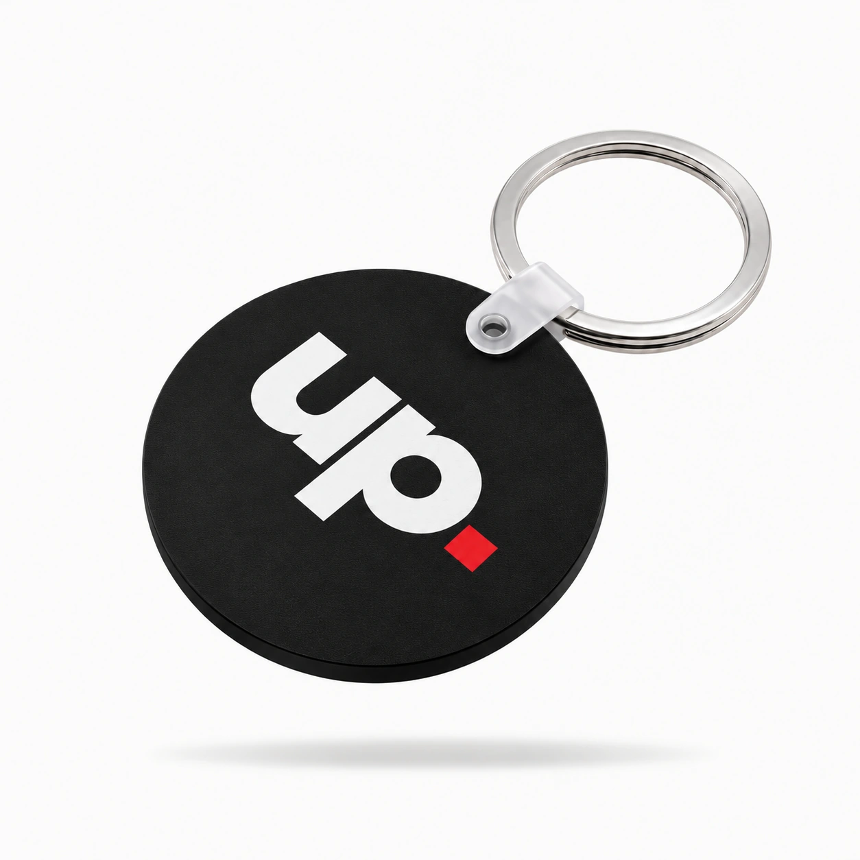 Porte-clé noir UP avec carré rouge.